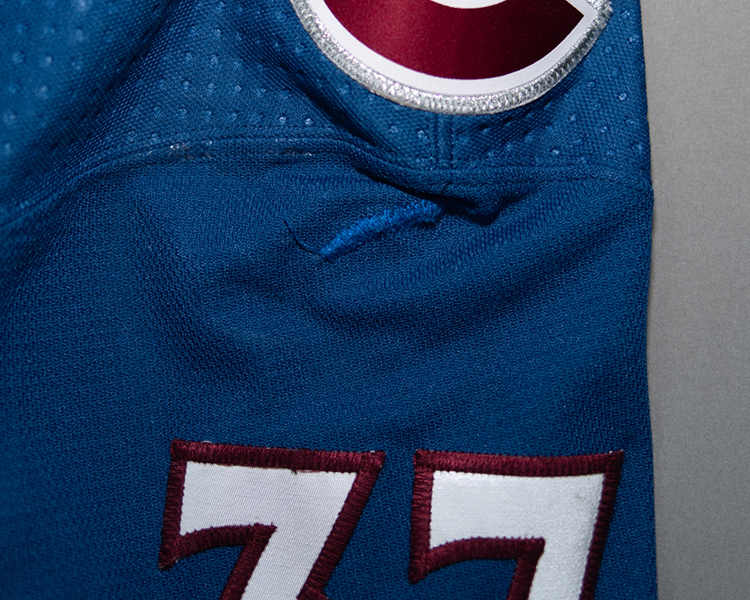 JT Compher game worn jersey left sleeve damage JT Compher game worn jersey left sleeve damage