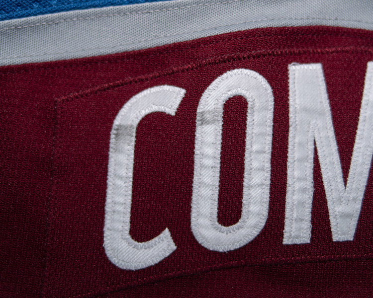 JT Compher game worn jersey shoulder damage JT Compher game worn jersey shoulder damage